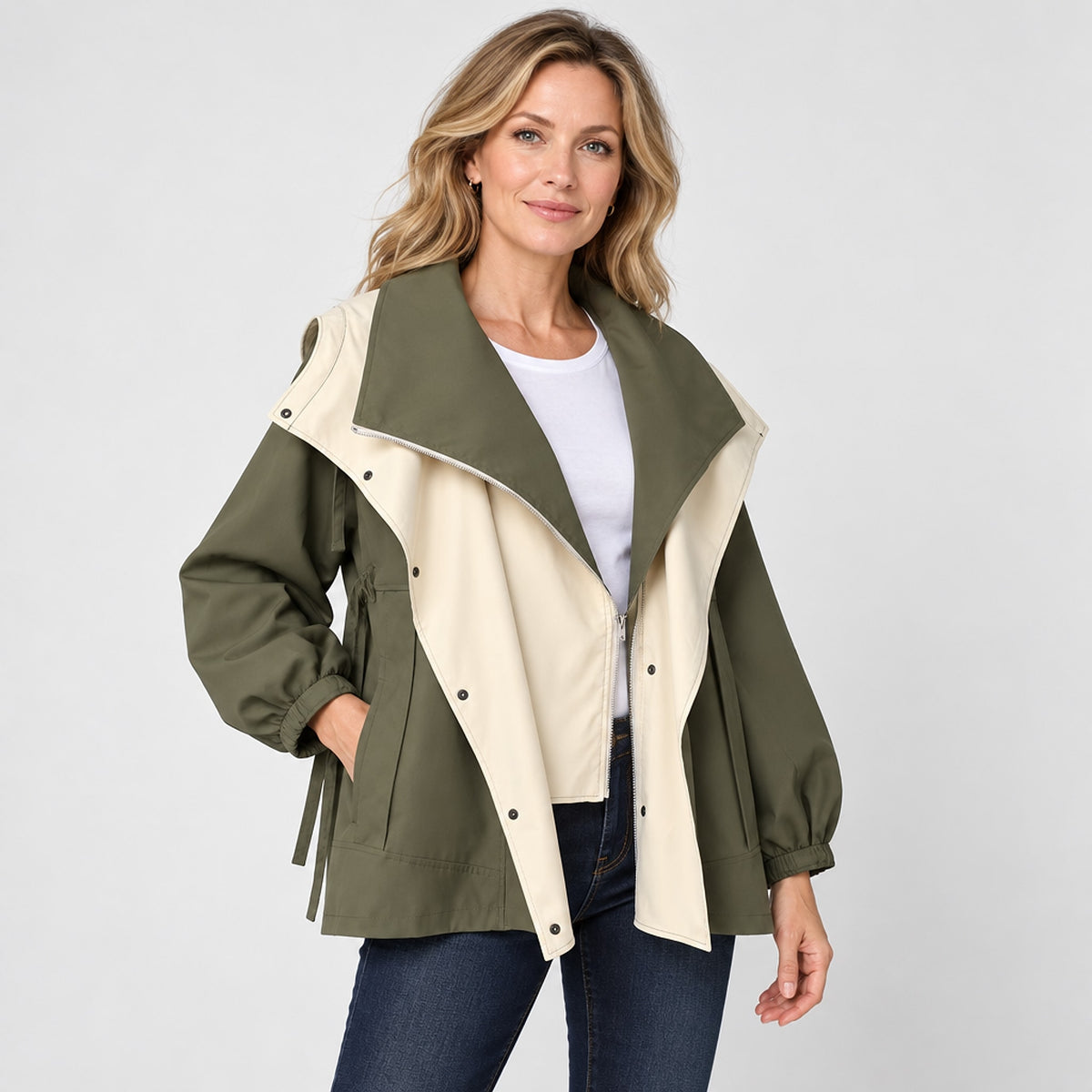Jacket in olive green with cream inner lapel, smooth matte fabric.