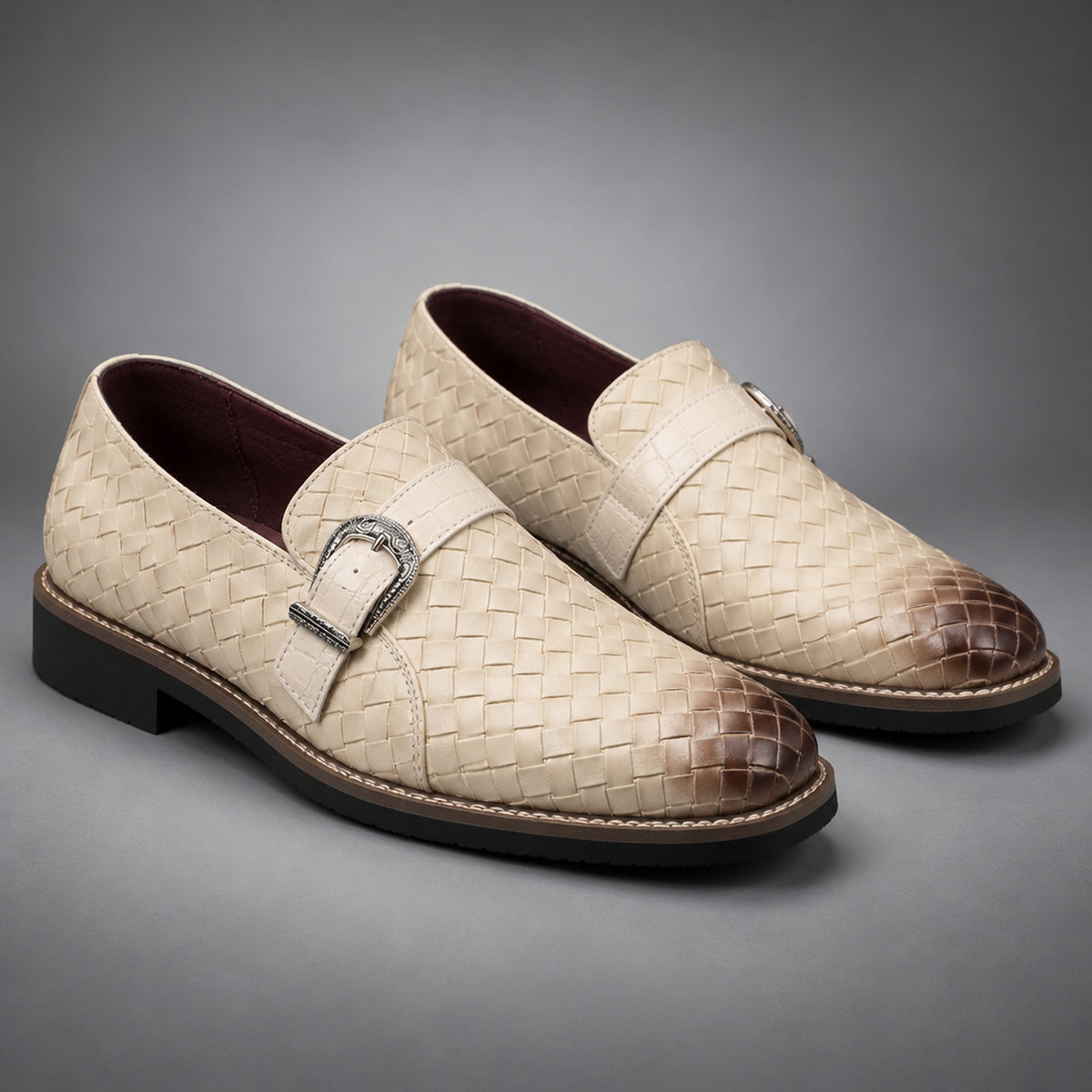 Cream woven loafers with a brown gradient effect and a dark brown sole.
