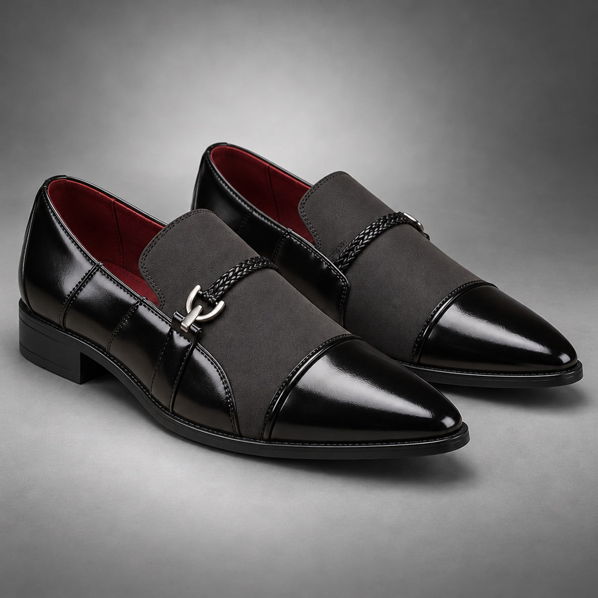 Black loafers with glossy leather-look sides and a matte suede-look across the upper.