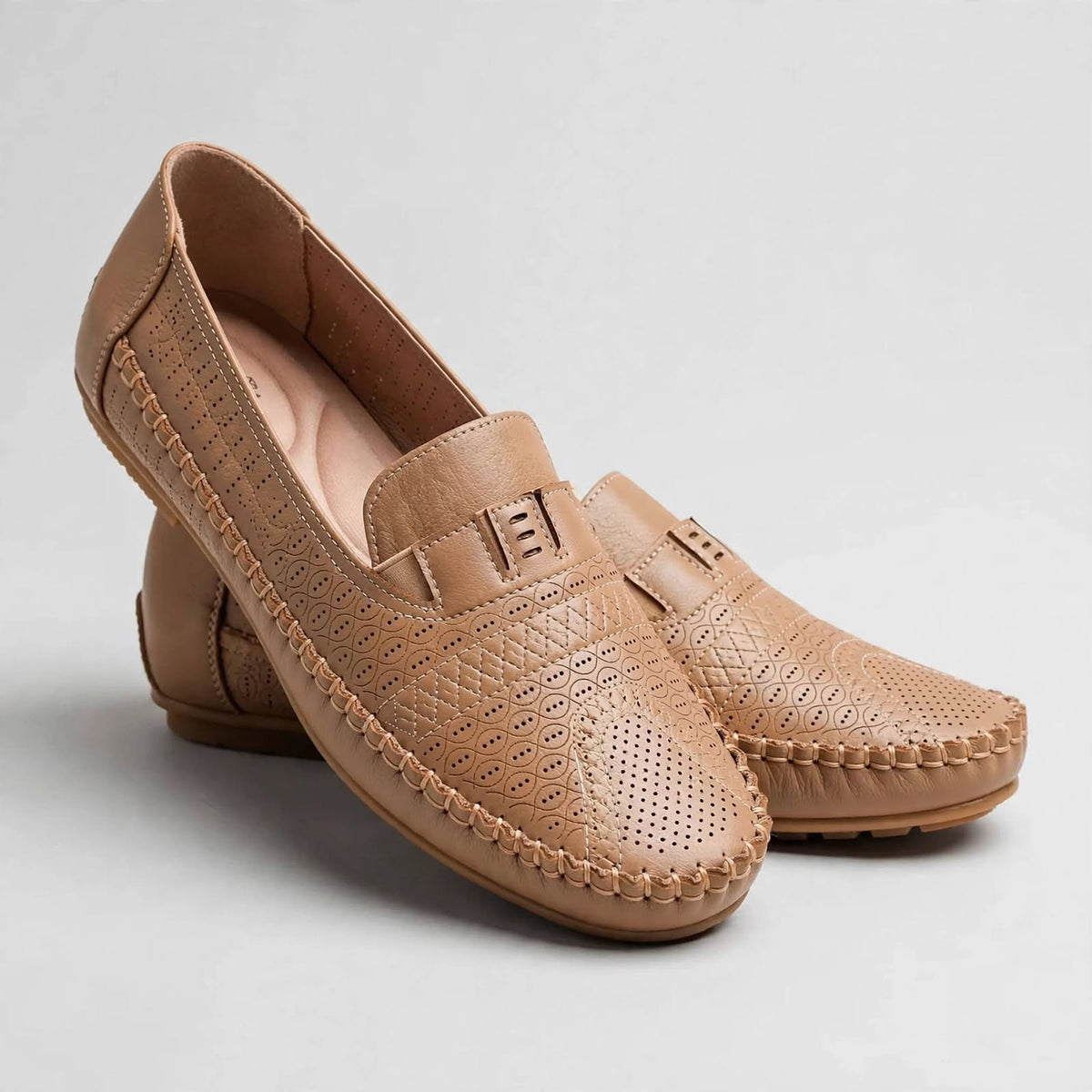 Loafer in light tan with matching stitching and a light tan sole.